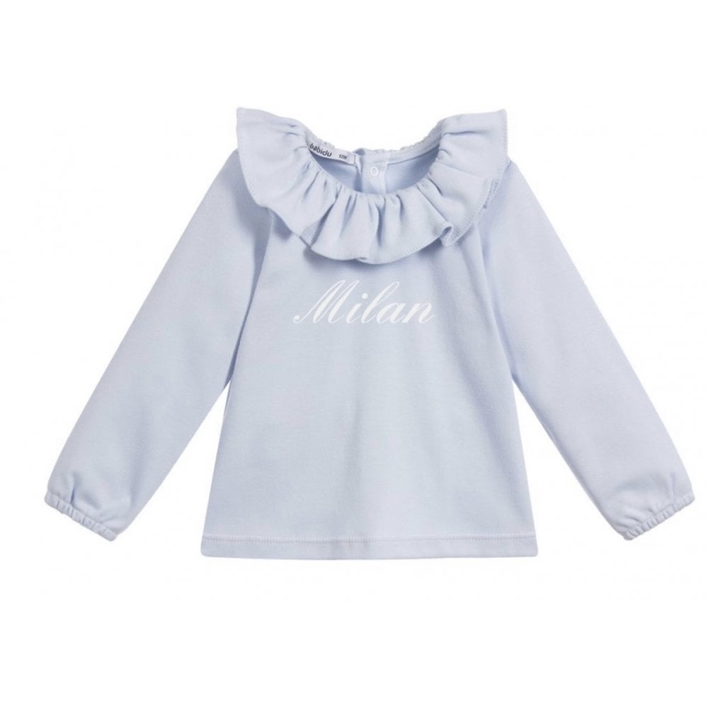 81117 blue frill neck top