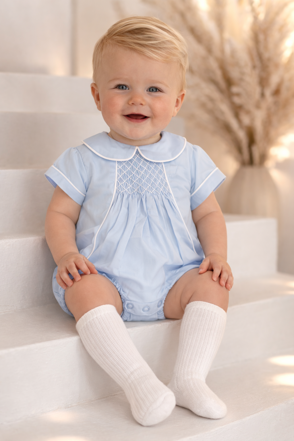 Baby Boys Blue Smocked Romper Suit