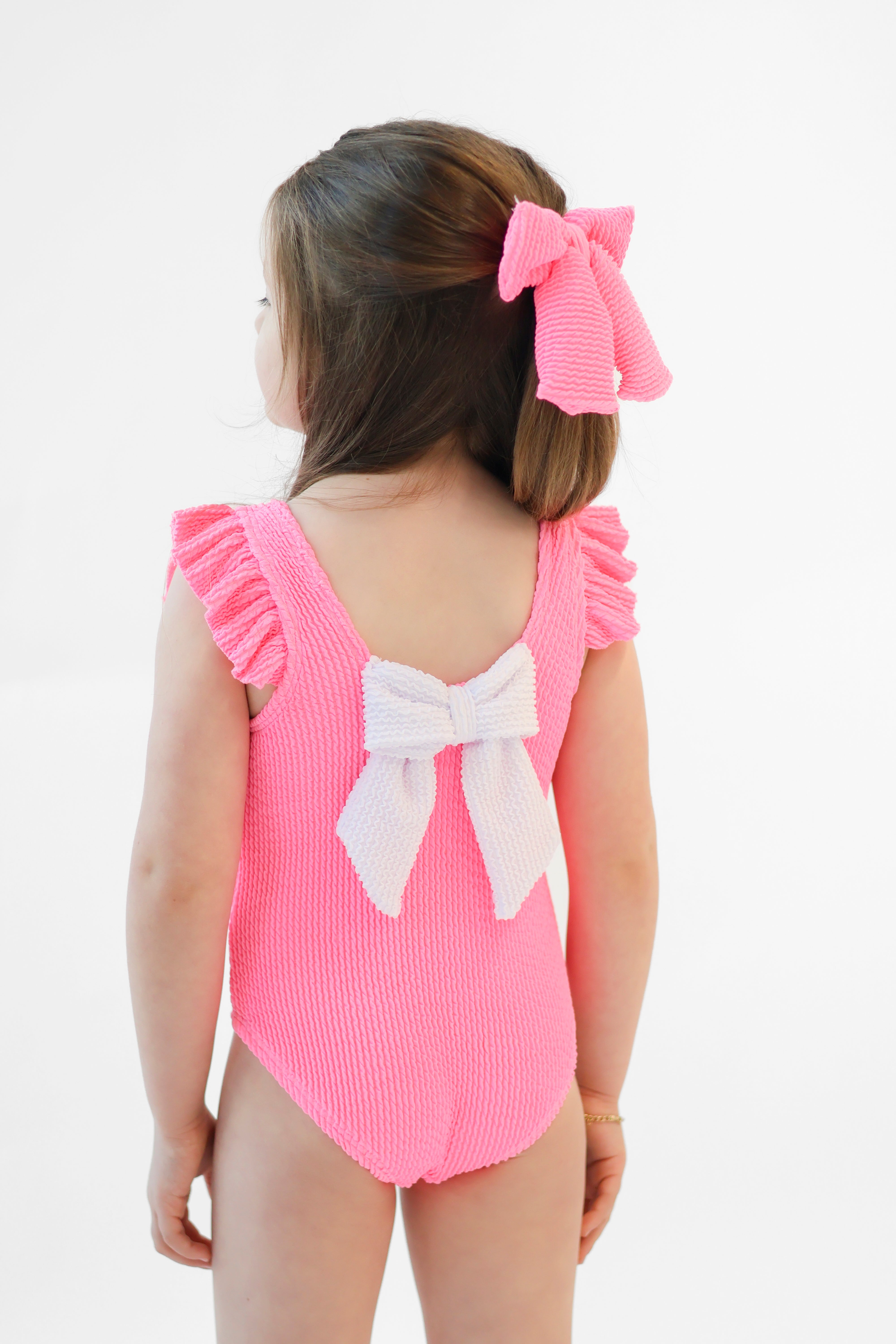 Lyla Girls Waffled Frilly Bow Swimming Costume Fuschia