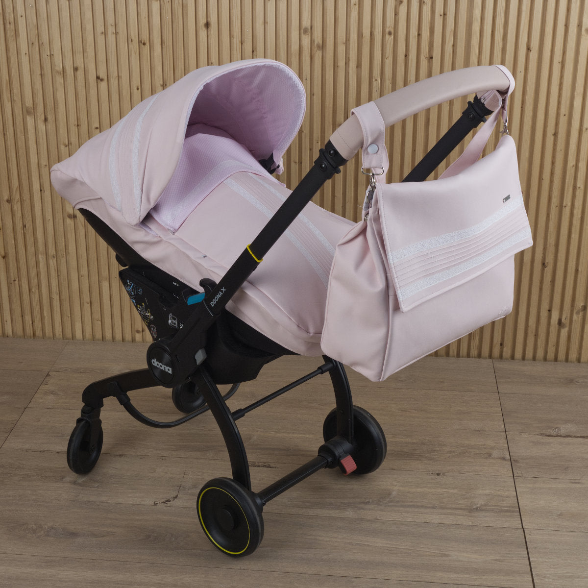 025246 Doona X Car Seat LUXURY Special Edition Lace Cover Leatherette Pink