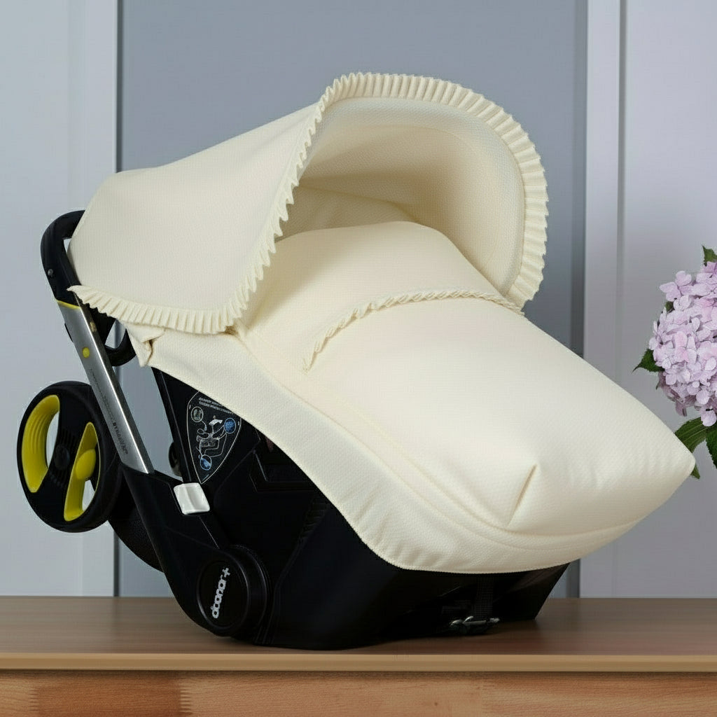 070245 Doona X Car Seat Cover Cream